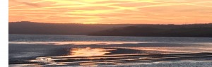 golden dawn estuary reflections